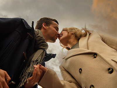 A couple on a winter walk during a romantic getaway at the Hotel Winzer