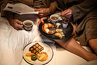 Breakfast in bed in a room at the romantic Hotel Winzer