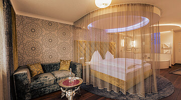 Doppelzimmer Emotion mit gemütlichem Bett im Romantik-Wellnesshotel Winzer